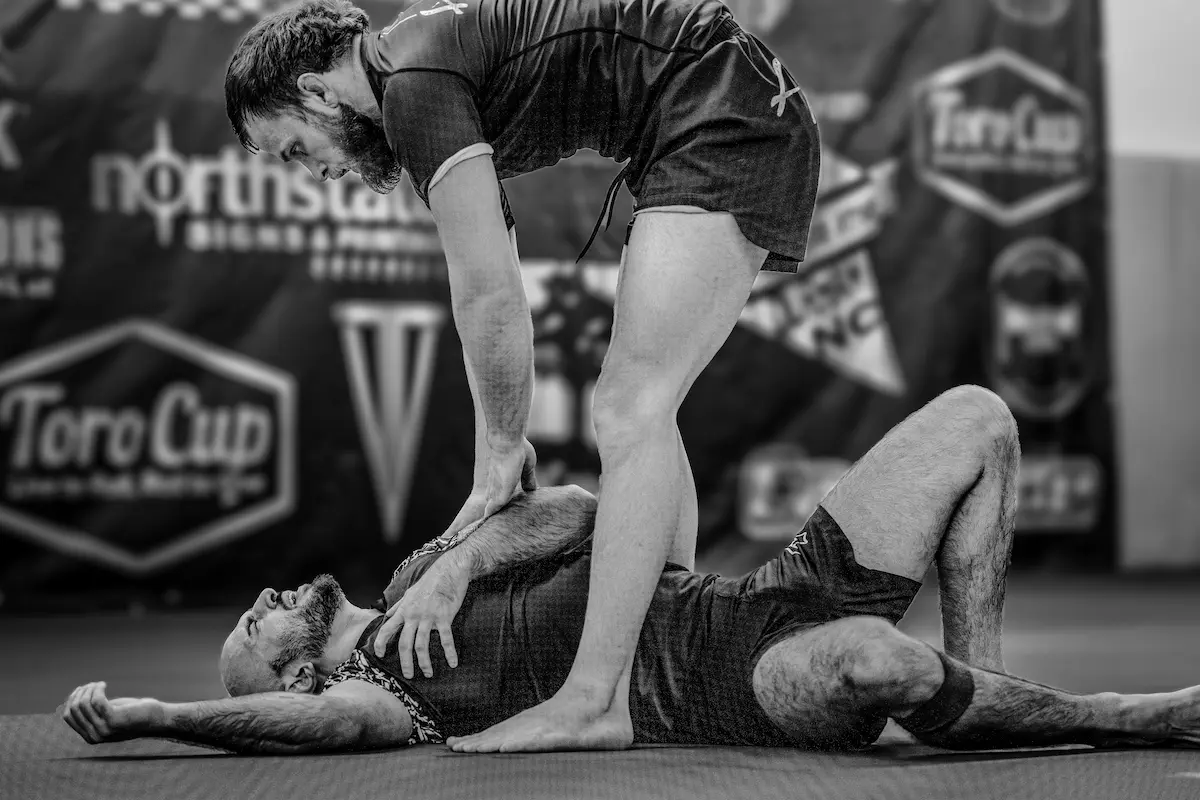 Mike 'Mikey' Powell controlling side control on an opponent at Toro Cup.