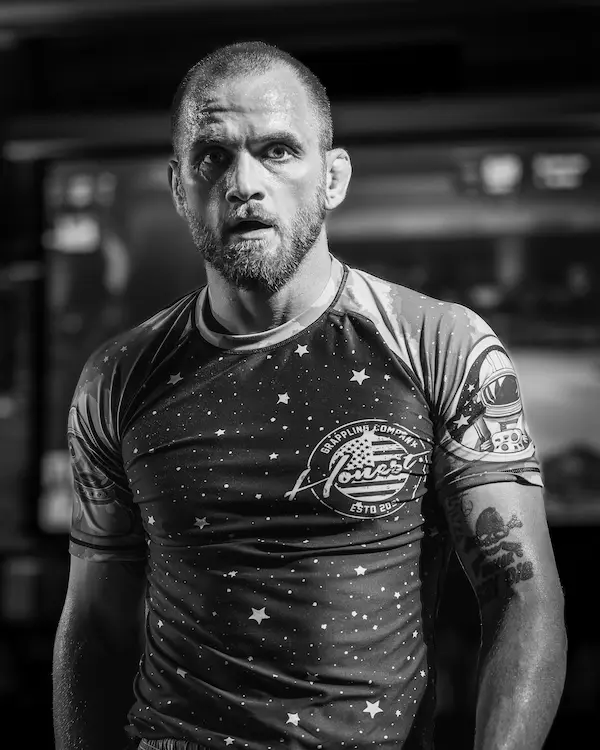 Mike 'Mikey' Powell standing over an opponent after a finish at Toro Cup.